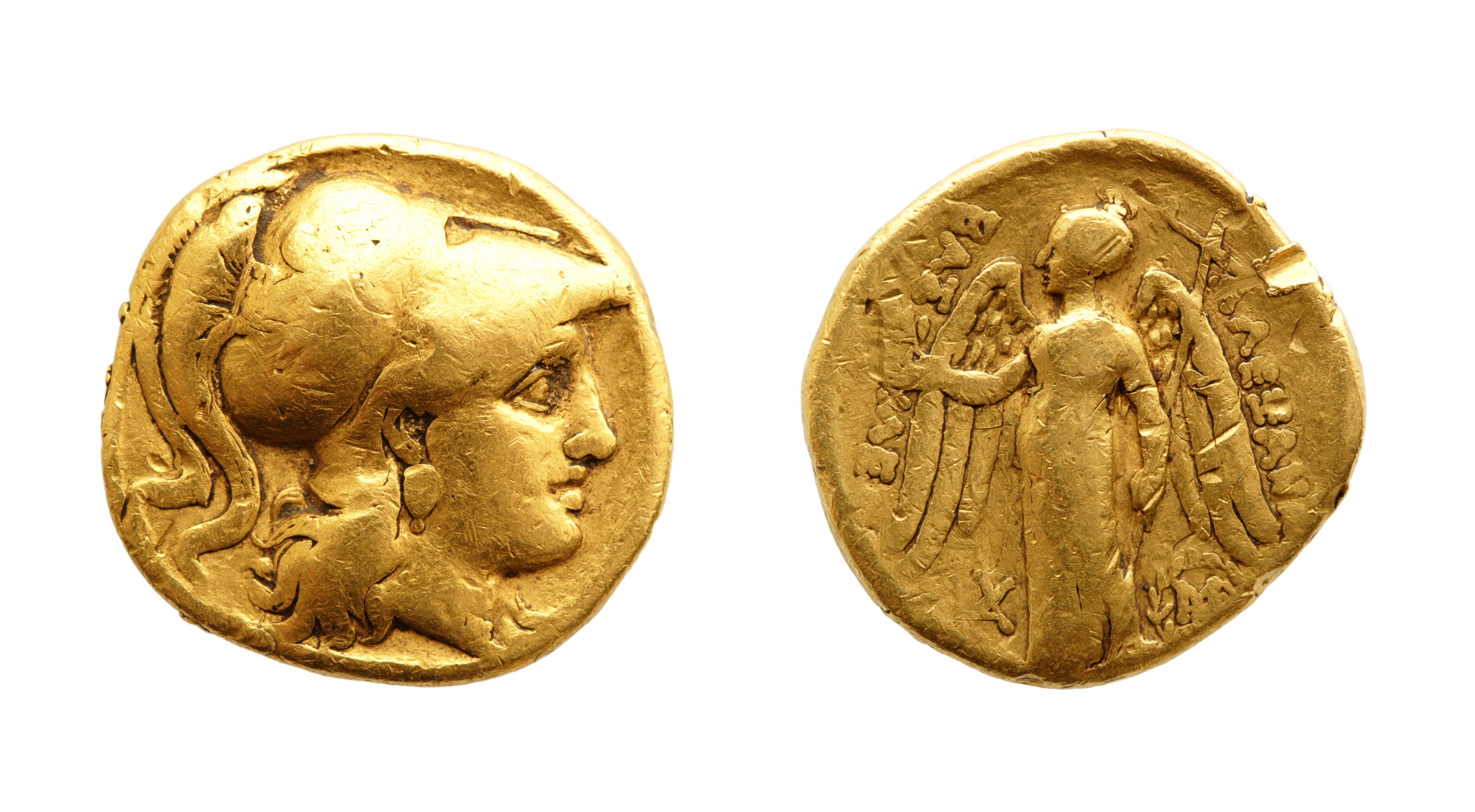 Collection of ancient Roman and Greek coins from various empires